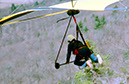 Hang glider takes off